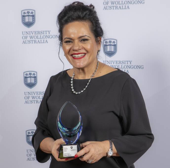 Vocal campaigner: Chief executive of Sutherland Shire Family Services, Diane Manns, receives an award from the University of Wollongong for her work in having a positive impact on social change.