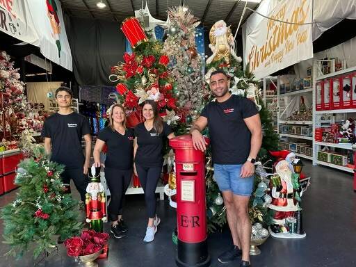 Christmas Crazy shop at Taren Point is decking the halls for Christmas. Staff including manager Freda Tsahos, pictured second from left, are bringing the sparkle to Sutherland Shire. Picture supplied
