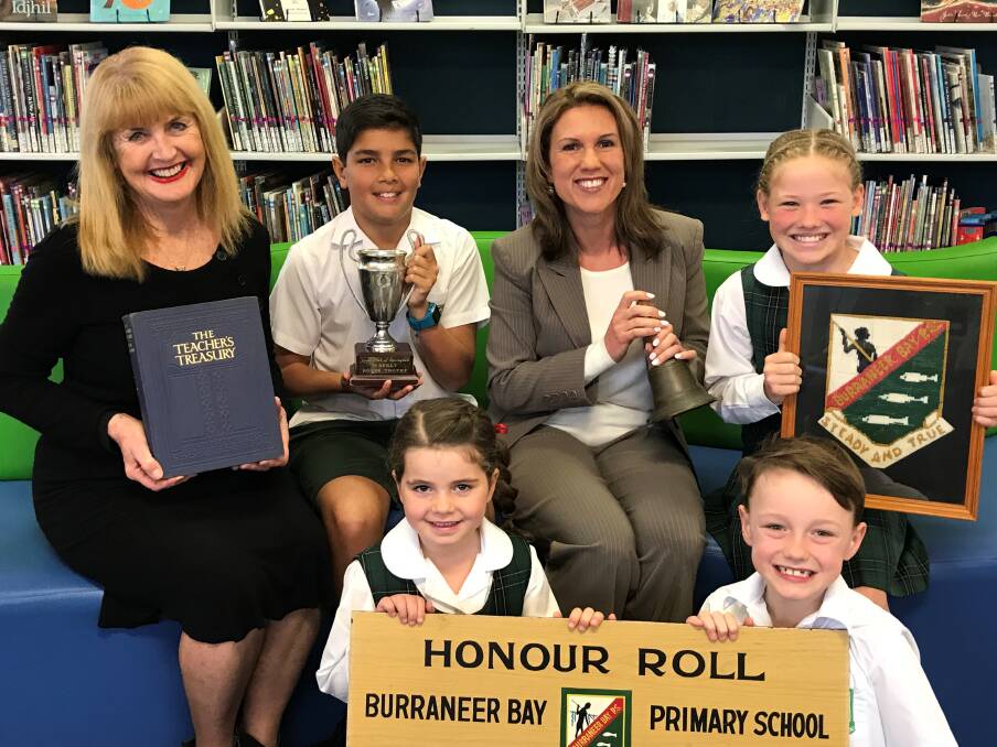 Long history: Teacher and former pupil Narelle Georgouras and principal Victoria Pantelis with children Zach Watson, Talea Miller, Isobel Dean and Will Solomon.