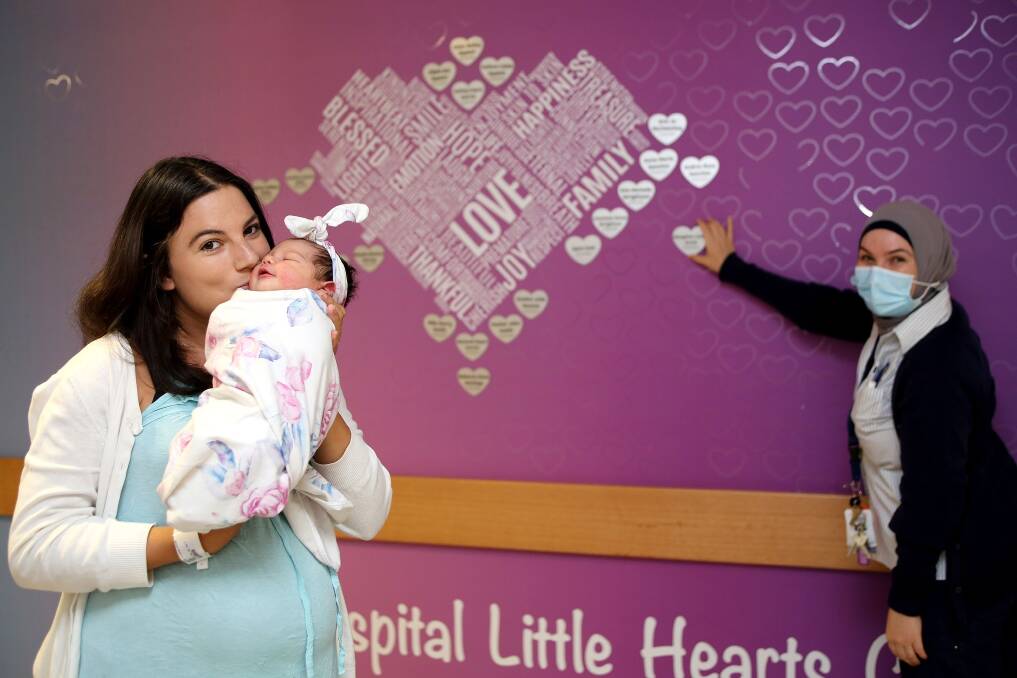 A whole lot of love: New mum Angela Makris with her baby girl Emmelia at St George Hospital, which has launched its Little Hearts Club on Valentine's Day. 