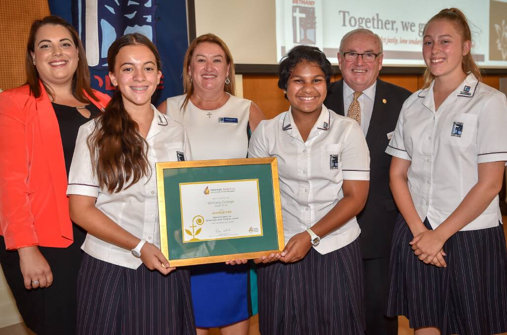 Recognition: Bethany students and their certificate pictured with College program facilitator Kelly Smit, principal Robyn Rodwell and Sydney Catholic Schools executive director Dan White. Picture: Kitty Beale