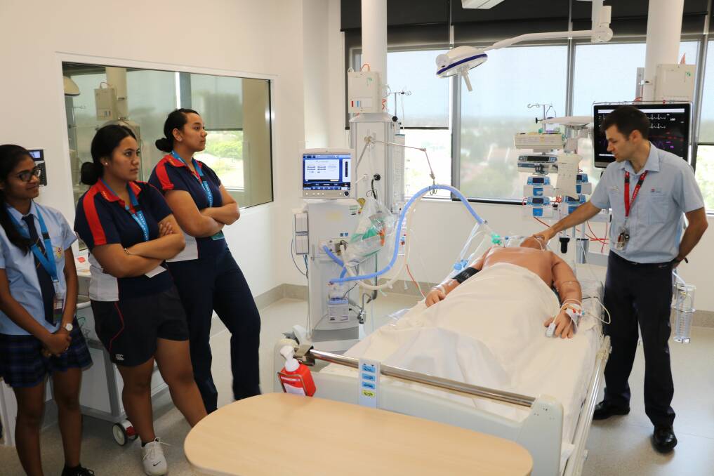 Hands-on action: Clinical nurse consultant Benjamin Wood takes students through a typical case in the intensive care unit. 