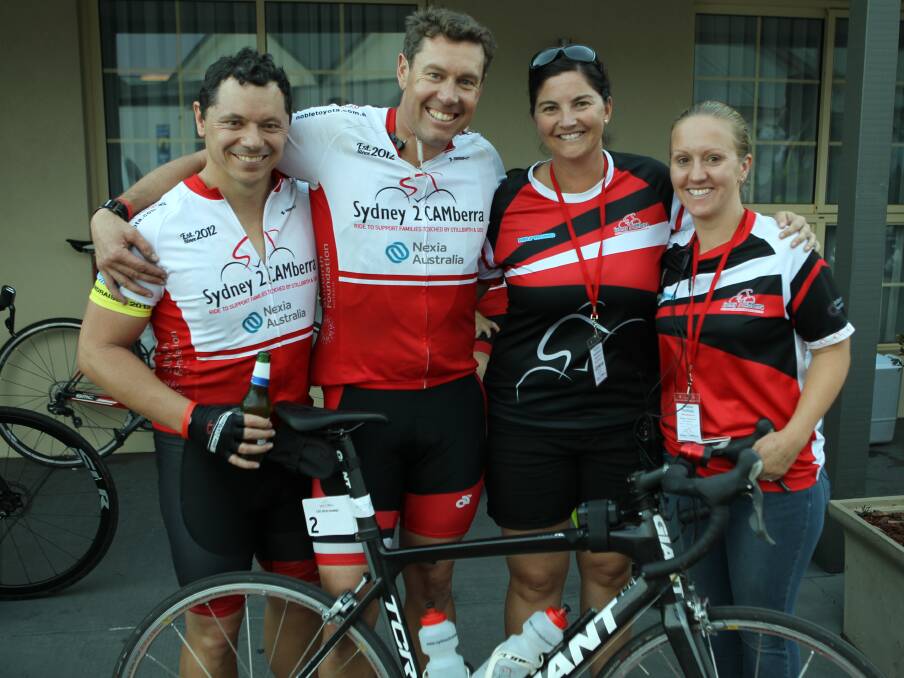 Riding together: Charity ride founder Lee Heslehurst (second from left) with Graham (far left) and Nadine Belfield (far right).