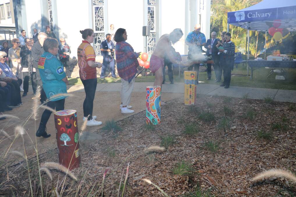 Sacred space: A smoking ceremony marks the opening of a new garden for Aboriginal patients and their families at Calvary Hospital. 