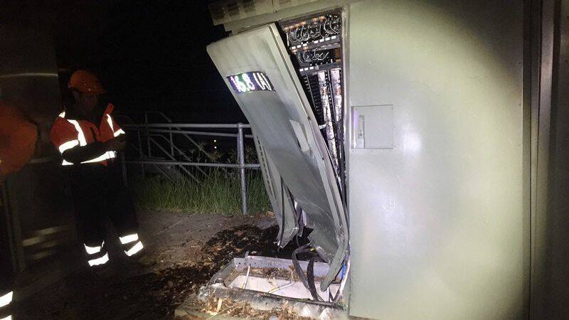 Crews inspect the damaged signalling equipment. Picture: Sydney Trains