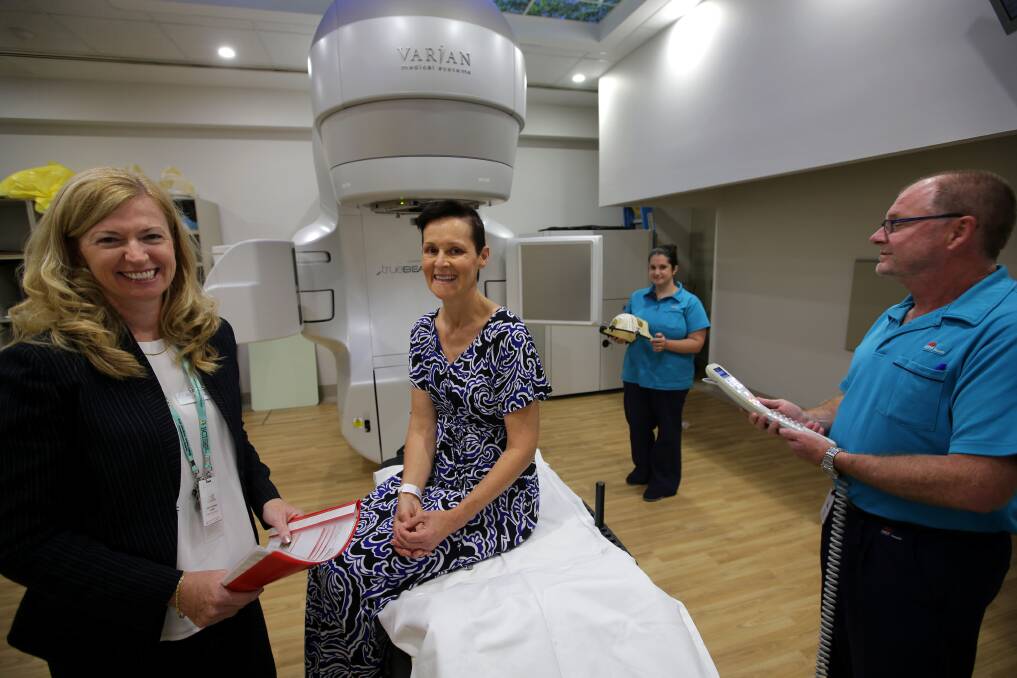 New treatment: Radiation oncologist Catherine Clark (pictured left) with Lisa Smith, the first patient to undergo new radiotherapy at St George Hospital's cancer care centre. Picture: John Veage