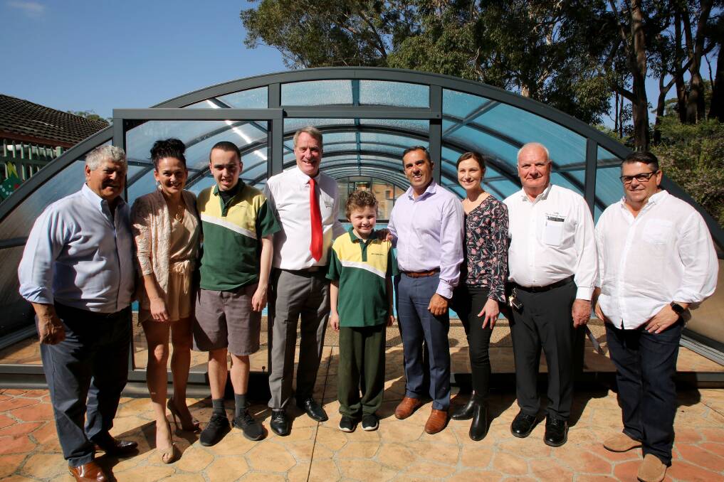 Collaborative result: Nick Feros of Feros Group, president of the Bates Drive P&C Shantelle Tagg, principal of Bates Drive Public School, David Toogood, Sutherland mayor Carmelo Pesce, Sutherland Shire Council environmental scientist Bec Williams, trustee at St George Children with Disabilities Fund, Garry Morris, with students Lachlan and Lincoln.