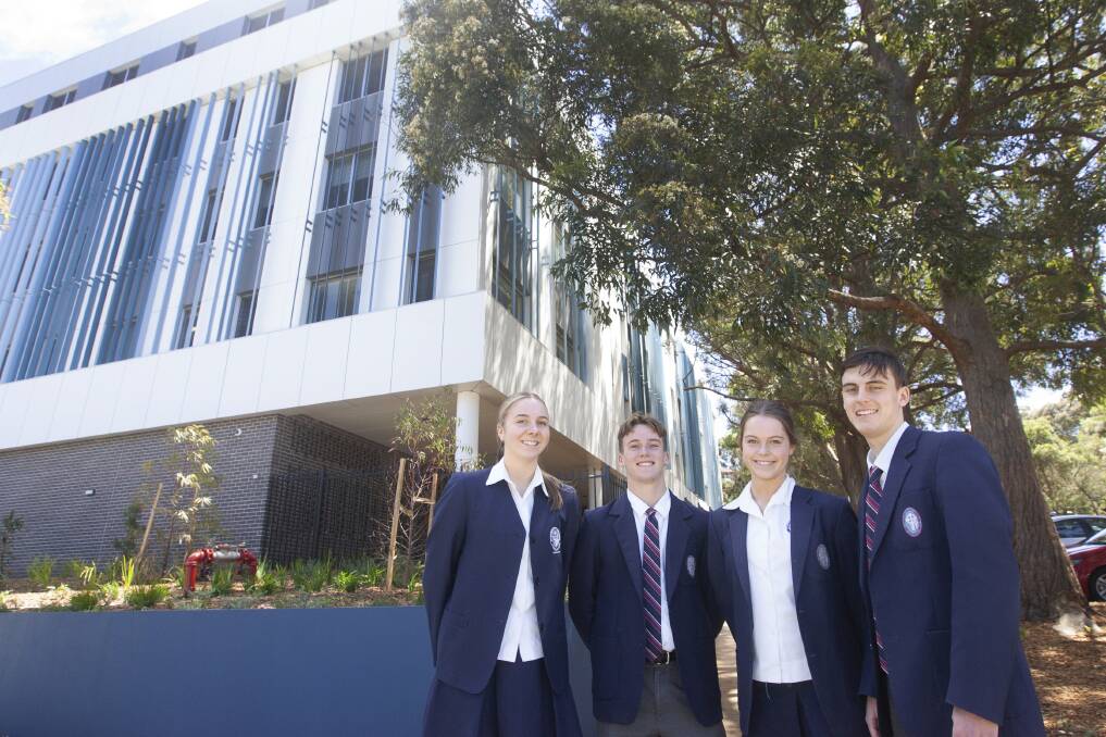 Modern learning space: St Patrick's College Sutherland's year 11 student leaders Charlize Barr, Kurt Dearsley, Sophie Hart and Ryan Andrews outside the school's new Alpha Crucis building.