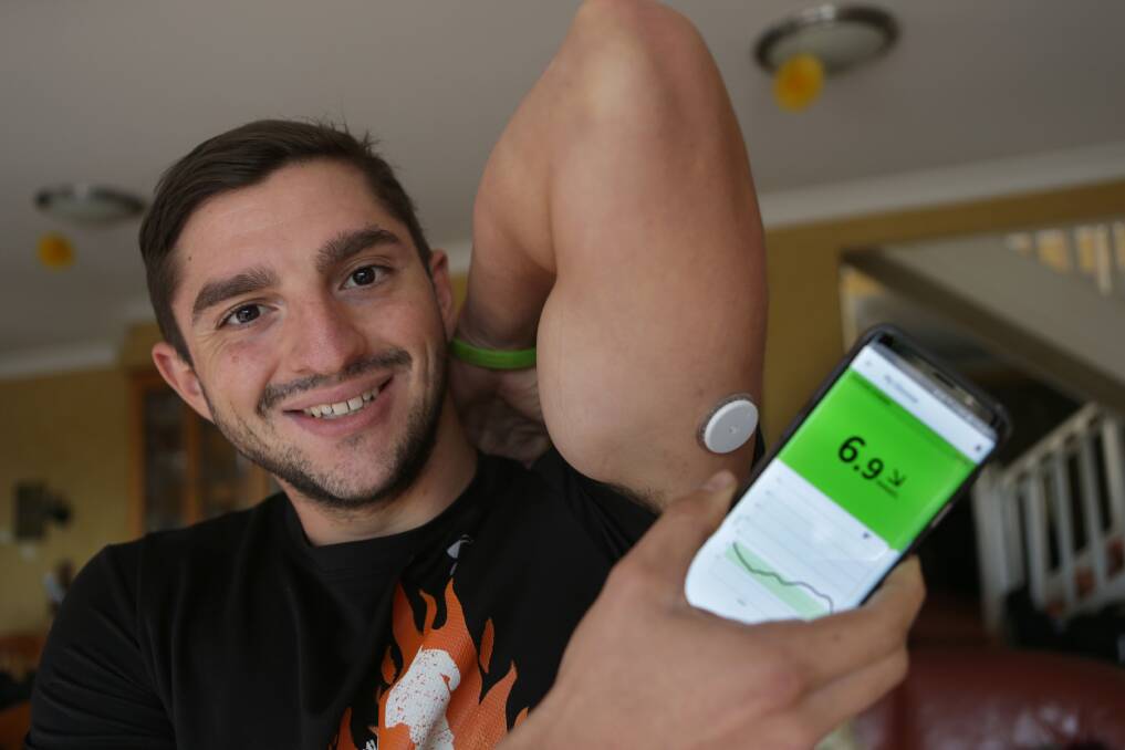 Digital record: Jason Follone has type 1 diabetes. He is now able to monitor his blood sugar levels using an app on his phone. Picture: John Veage