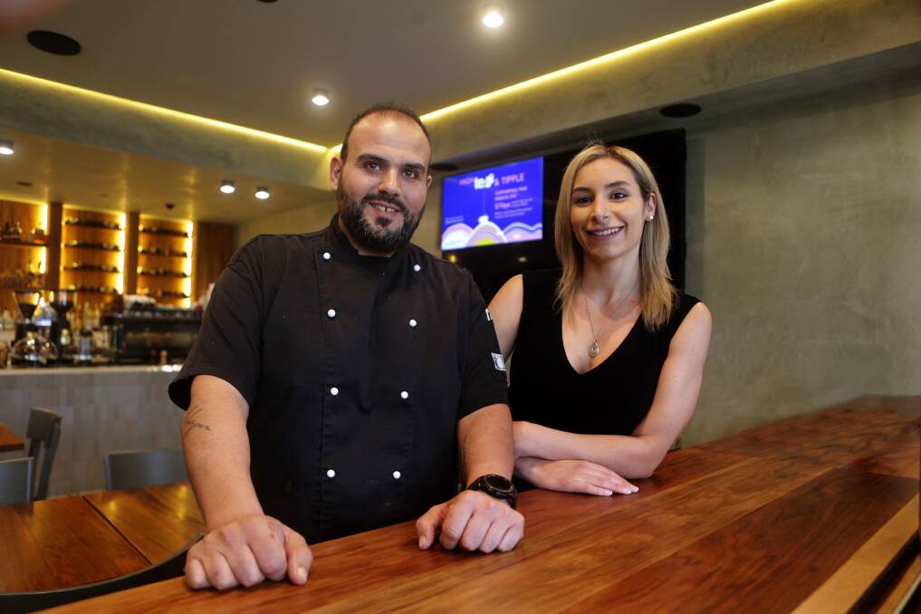 Fundraising in business: Head chef of Gumbaya Cafe at Illawong, Noel Melan, with wife Renata, is supporting this year's Pink Ribbon campaign. Picture: John Veage