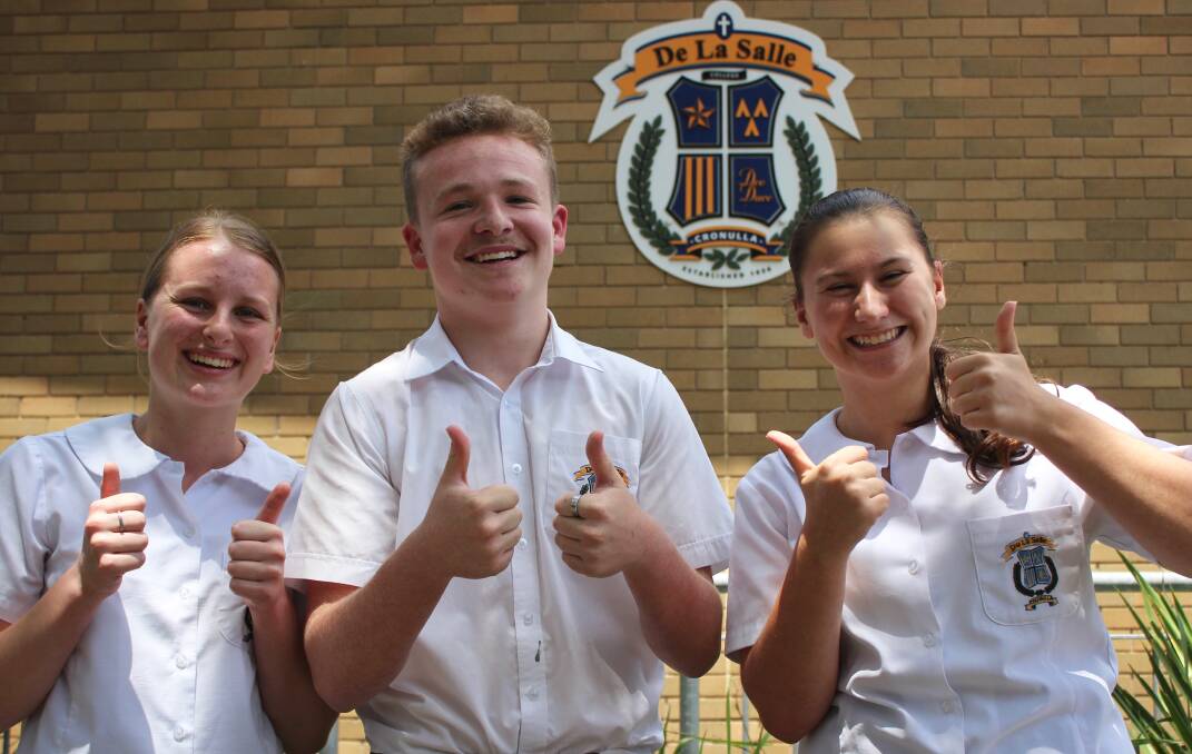 De La all done: Year 12 students from De La Salle College Cronulla, Zoe Cassar, Jack Rothfield and Gabby Ofria on their final day of HSC exams. Picture: Supplied.