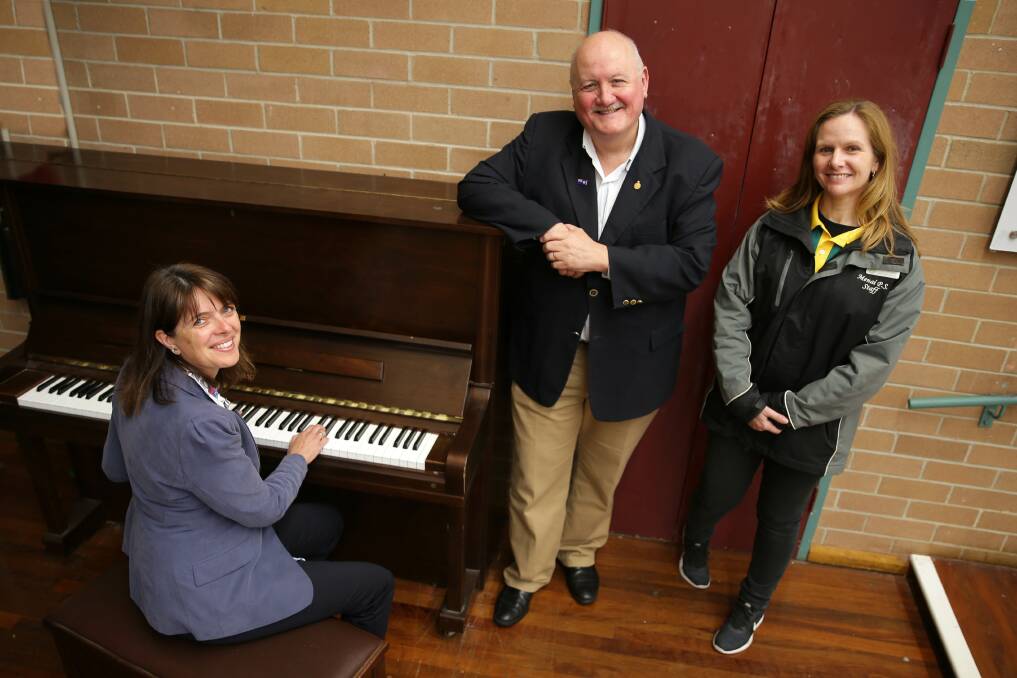 Tune of success: Menai Public School has secured a $20,000 grant to expand its new school band. Pictured: Heathcote MP Lee Evans with Menai Public School Principal Kate Drury and P&C representative Nicola Enz Quealy (far left). Picture: John Veage