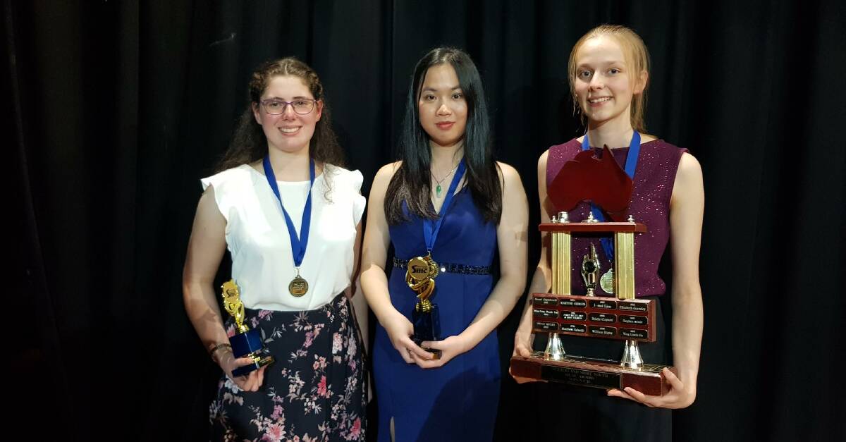Performance winners Rachel Fitzpatrick (piano, third place), Josephine Su (flute, second place), Hannah Millar (alto saxophone, first place).