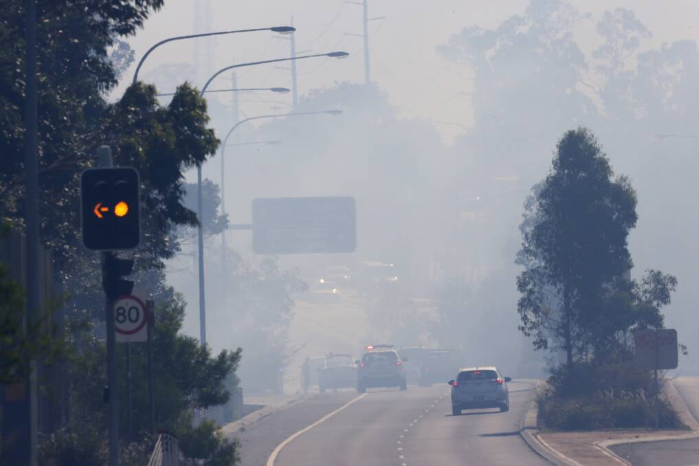 Drivers and people with health conditions such as asthma are advised to minimise exposure to fire-affected areas where smoke may still be present. Picture: John Veage