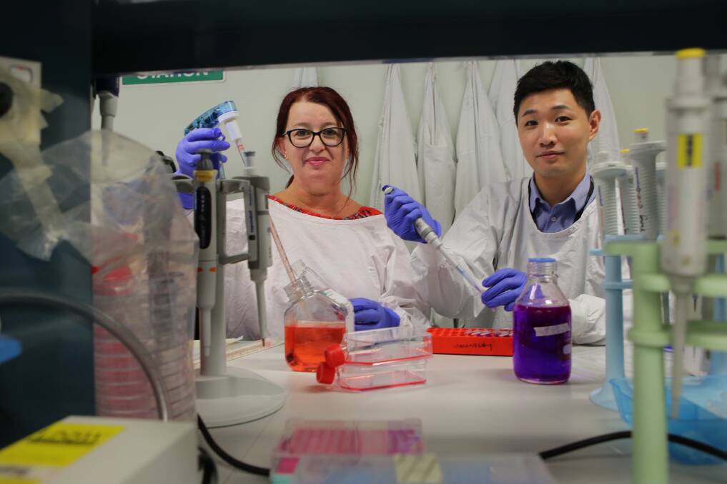 Blood work: St George Hospital scientists Dr Julia Beretov and researcher Dr Jie Ni are carrying out significant medical studies with the ultimate goal of improving cancer survival rates through early detection. Picture: John Veage