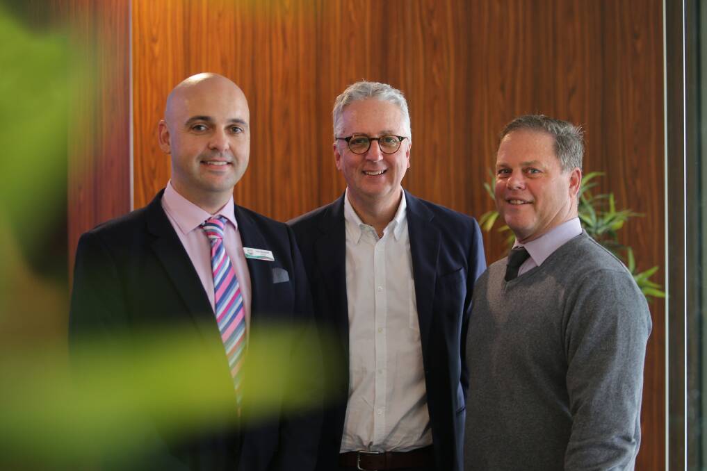 Out of the classroom: Primary and high school principals met with education executives at a statewide forum. Department of Education Secretary Mark Scott with school principals John Mazzitelli (left) and Craig Cleaver. Picture: John Veage