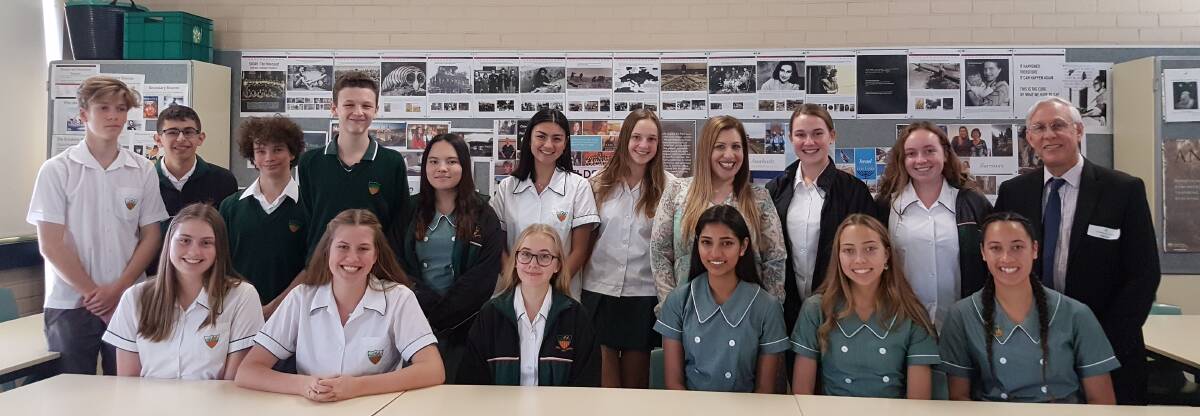 Expanding global understanding: Academic expert and author Ephraim Kaye (pictured back row, fourth from right) with students at Caringbah High School as part of a cultural visit.