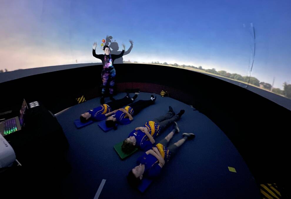 Pupils learn about space with the planetarium experience, run by orbit ranger Tammy Chappelow. Picture by Chris Lane