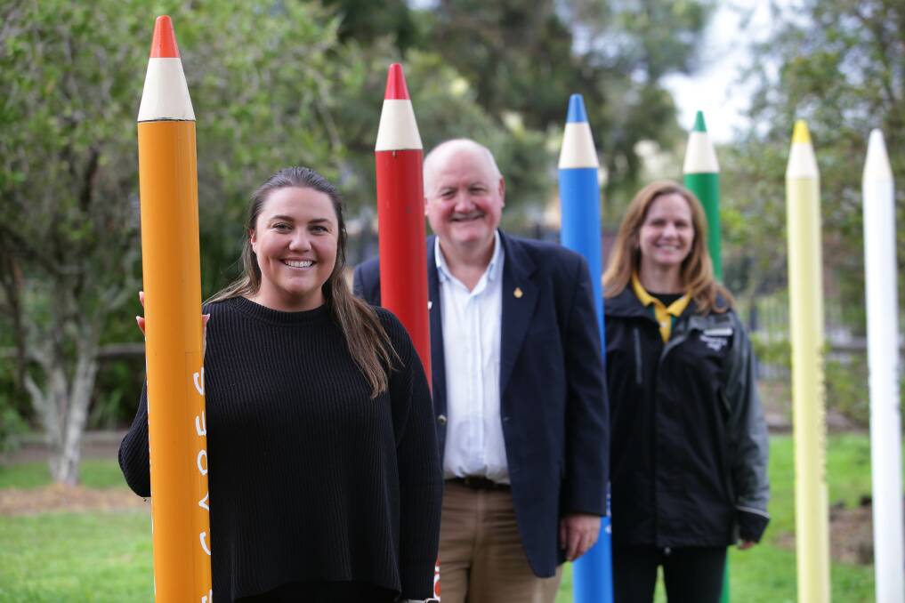 High standards: Menai Public School teacher Rhiannon Wall (far left) also received recognition for attaining the highest levels of national accreditation. She is pictured with Heathcote MP Lee Evans and principal Kate Drury. Picture: John Veage