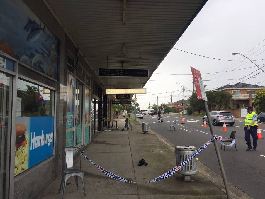 Police at the scene on Friday after shots were fired into a cafe on Bestic Street at Kyeemagh. Picture: Chris Lane
