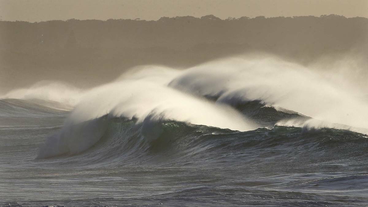 Windy breaks: A grey Cronulla day as Autumn finally shows its cooler side. Picture: John Veage 