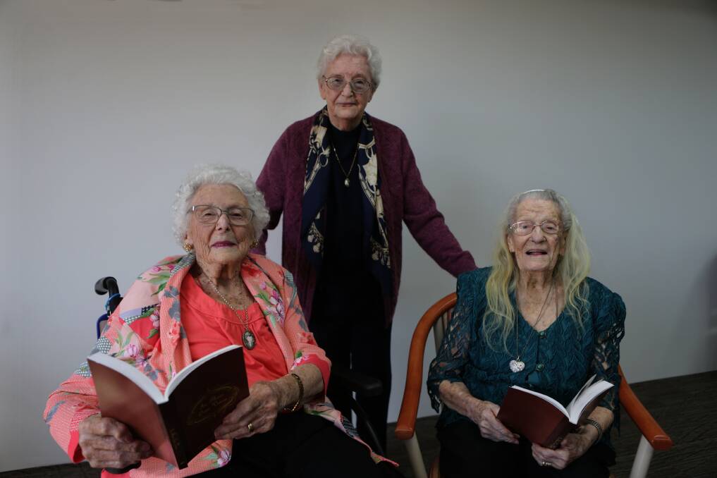 Pages of the past: Rose Rennie, Eileen Little and Evelina Zentilomo contributed their life stories to a project by Kogarah Writers' Group. Picture: John Veage
