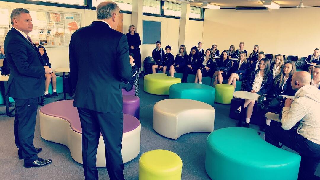 TV land: Seven News presenters Michael Usher and Jim Wilson answer questions from students at Engadine High School.