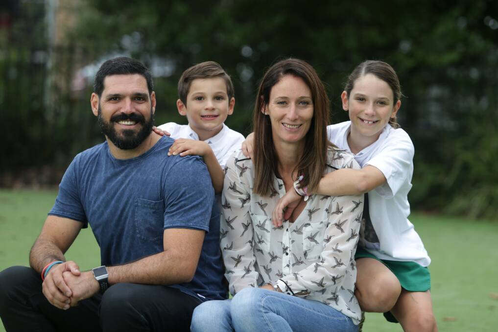 A family's honour: Levi's parents Ben Wheeler and Kathryn Wakelin with their two other children Archie and Olivia. Picture: John Veage
