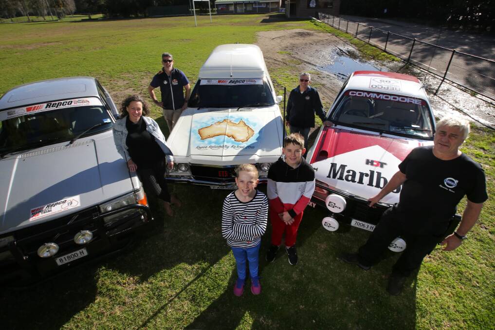 Engines ready: Justin Brooks, with wife Samantha and children Olivia and Julian, join Graham Brown and Darren Harris in Australia's Greatest Reliability Trial - a classic car fundraising adventure. Picture: John Veage