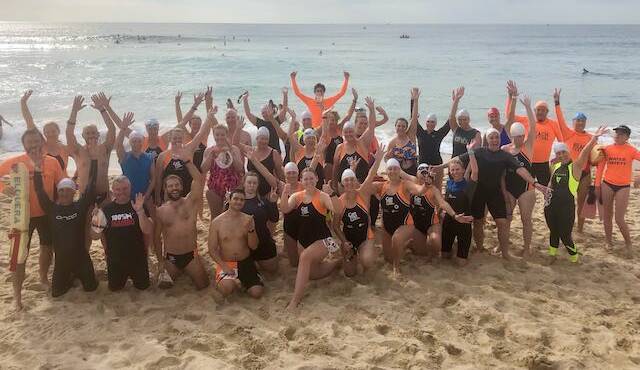 Physical and mental well-being: Can Too Foundation fundraising participants at an Elouera ocean swim event. 