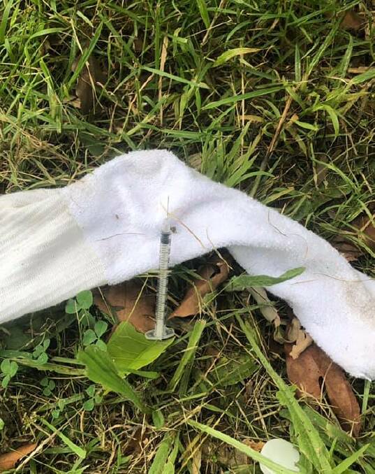 In full view: This syringe was found in a grassy area near Port Hacking High School at Miranda on Monday. Picture: Kylie Hockey