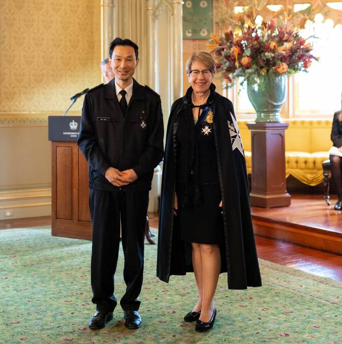 Recognition: Eric Tam received a volunteering award from Her Excellency the Honourable Margaret Beazley.