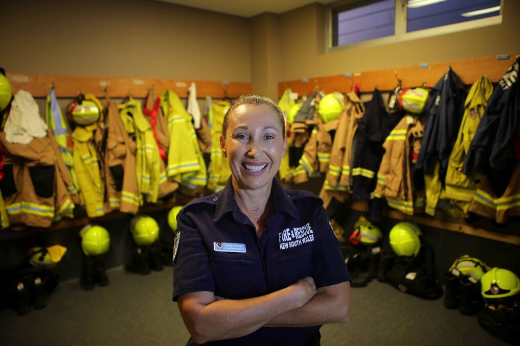 Ready to respond: Fire & Rescue NSW firefighter Sharon Hodges, who is based at Bundeena, is gearing up. Picture: John Veage