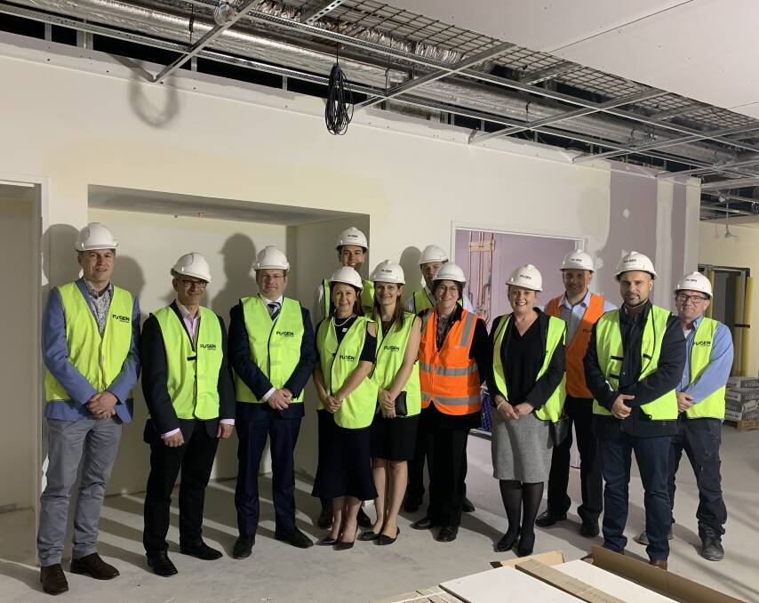 Project on track: St George Hospital general manager Leisa Rathborne, Oatley MP Mark Coure, nurse and midwifery manager Lorena Matthews, obstetric staff specialists Emmanuel Karantanis, Oatley MP Mark Coure, hospital staff and representatives from contractor Fugen Constructions.