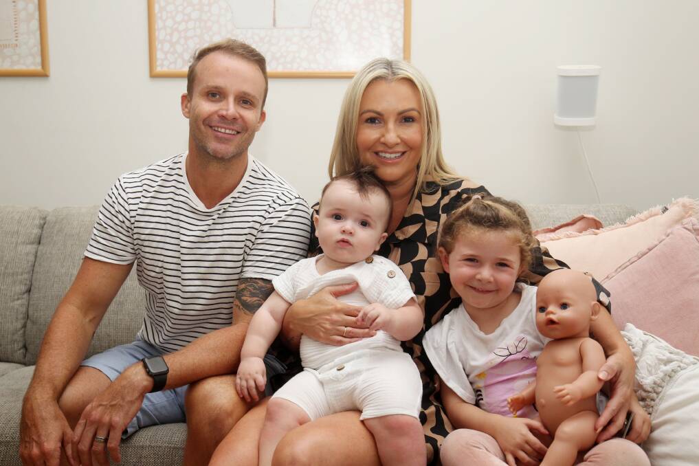 Gymea's Scott and Amy Maree Campbell with their children Taane, nine months, and Alinta, three. Both were conceived via IVF. Picture by Chris Lane