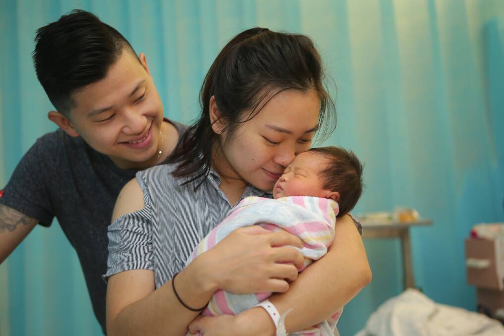 Hello little lady: New parents Michael and Ribka Setiwan with their baby girl Brielle, born on Mother's Day. Picture: John Veage