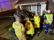 Crash: A car smashed into a house at Blakehurst on late Thursday afternoon. Picture: NSW Ambulance