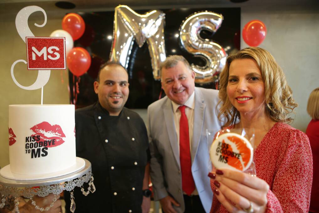 A healthy mission: Valentina Petreska, Gumbuya Cafe chef Noel Melan and Liberal MP for Hughes, Craig Kelly, get into the spirit of community support for World MS day. Picture: John Veage