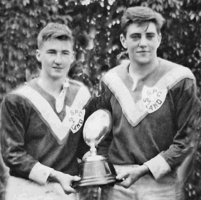 Team spirit: Former St Patrick's College Sutherland rugby great Grahame Bowen (right) with John Webster, after winning a St Pat's premiership in 1962.