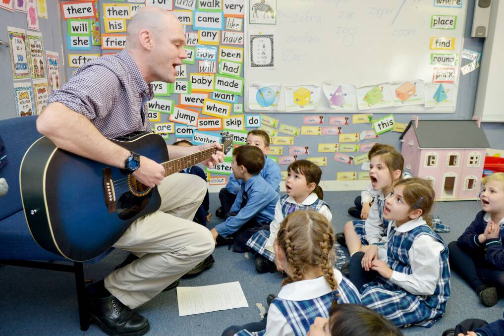 Sing-a-long: Primary school music teacher Dan Colquhoun is a YouTube hit. Picture: Sydney Catholic Education Office