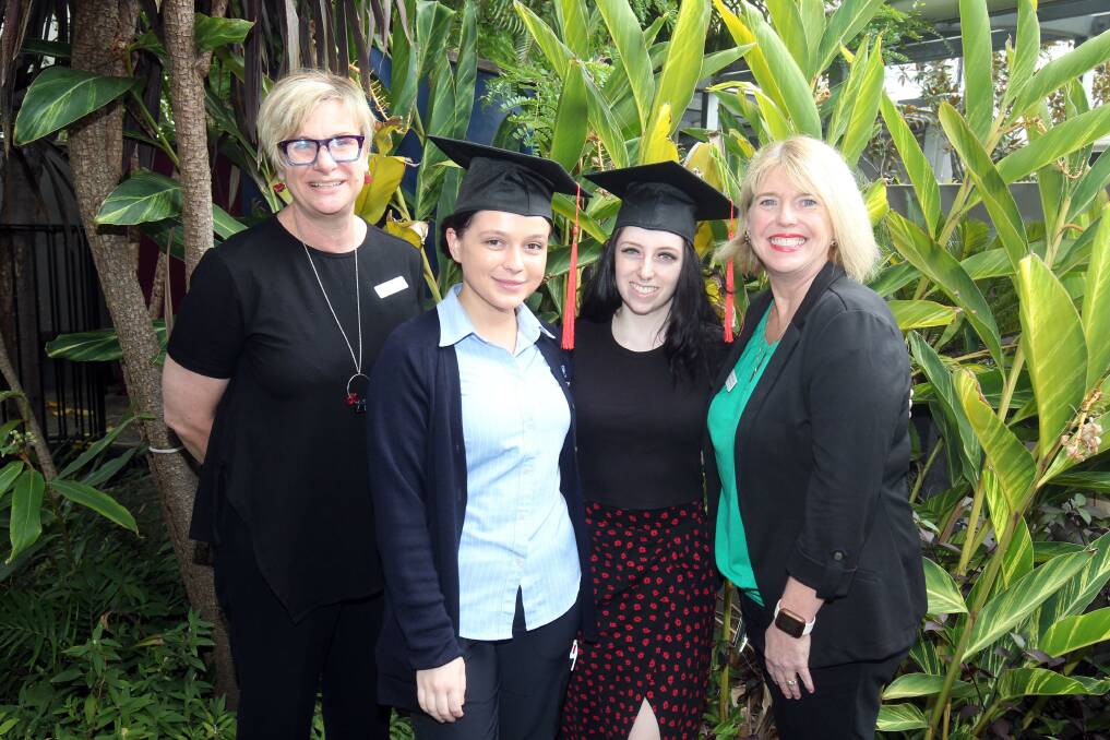 Two of the recent nursing graduates pictured at Calvary Kogarah, where they gained valuable experience in their work placements. Picture by Chris Lane