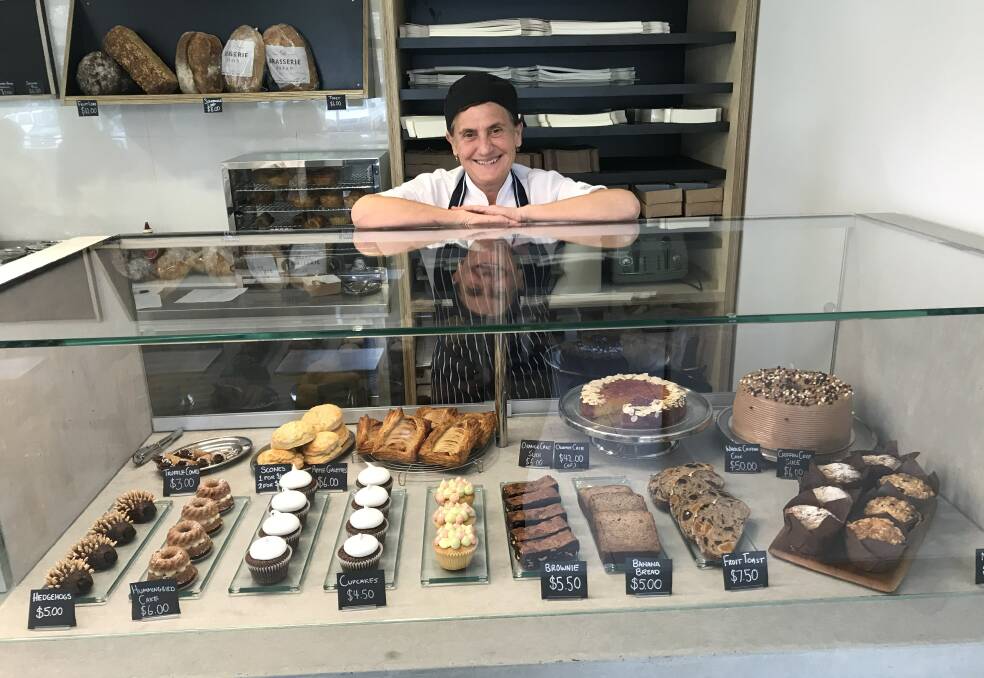 Tasty display: Banker turned pastry chef Maria Mayhew opened her first shop at Sutherland after re-training at TAFE.