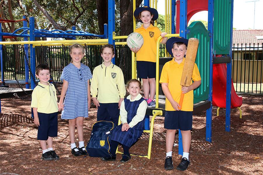 New look: Yellow and navy dominate the new uniform colours at Kirrawee Public School.