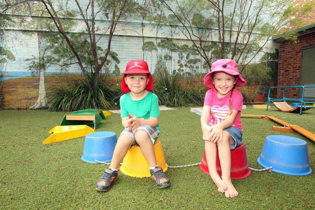 Valuable setting: Four year old Cooper and Hannah from Engadine Preschool Kindergarten, which will be one of several non-profit early childhood centres that will benefit from funding to help families access preschool education. Picture: Chris Lane