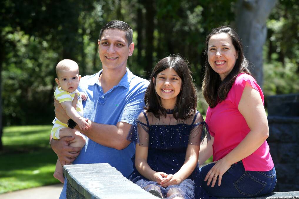 Home: Menai family Luiz and Luana Bon with their children Tomas, four months, and Maria, 10, become Australian citizens on Australia Day. Picture: John Veage