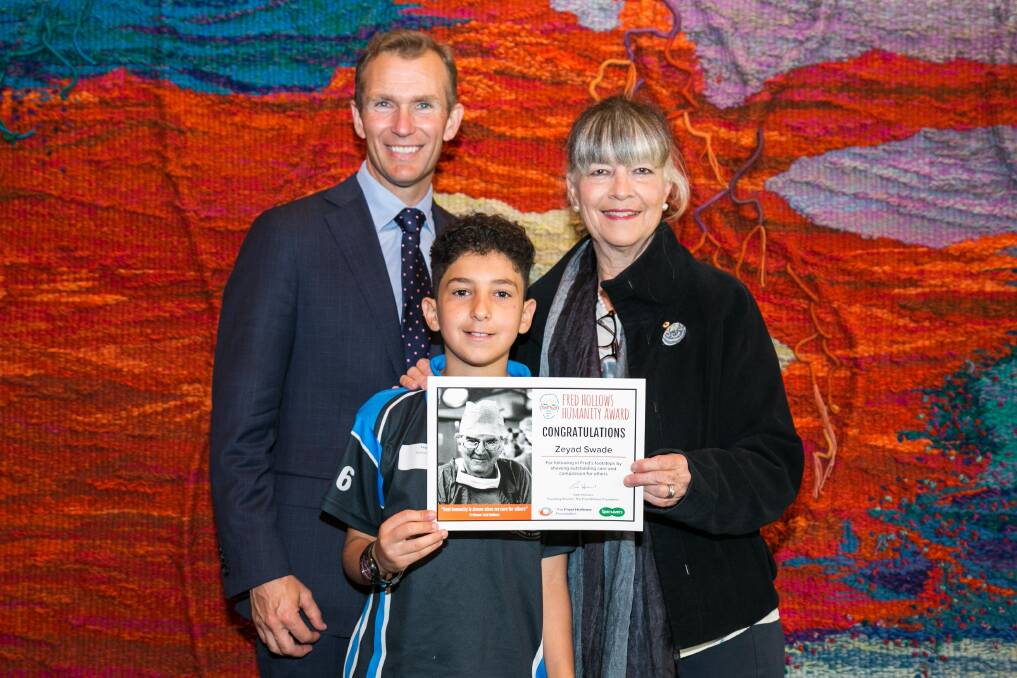 Statewide recognition: Peakhurst West Public School pupil Zeyad Swade with NSW Education Minister Rob Stokes and The Fred Hollows Foundation director Gabi Hollows. 