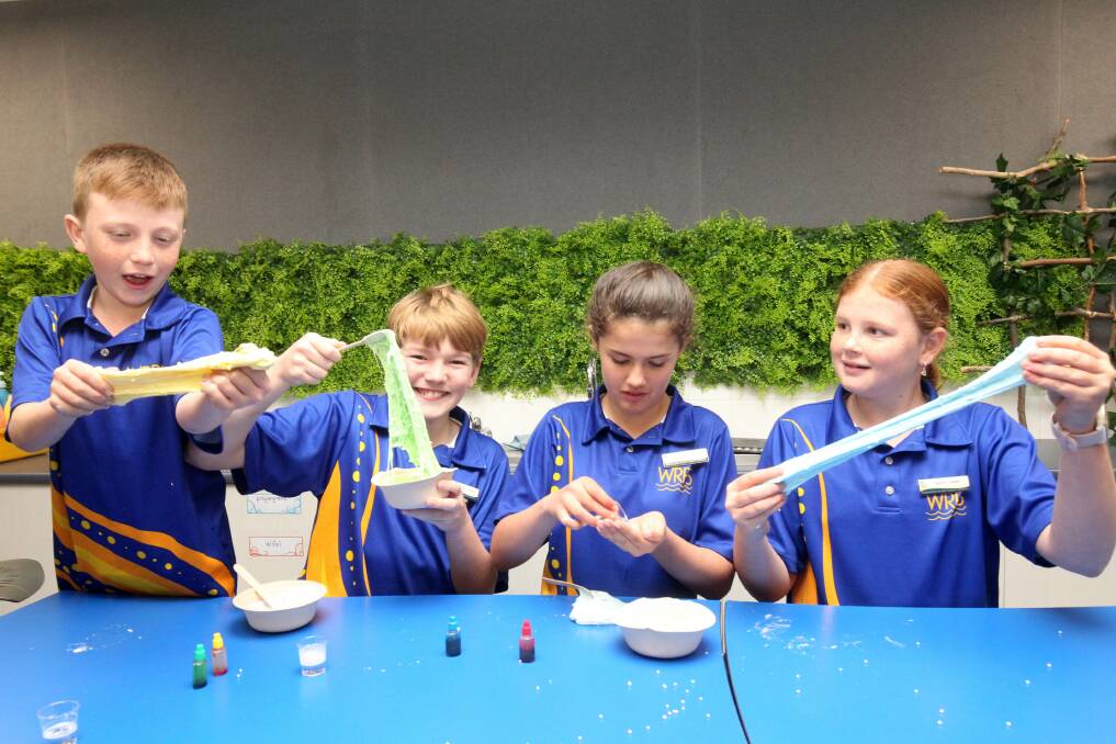 Dylan, Parker, Amelia and Amelia get scientific with slime during Science Week. Picture by Chris Lane