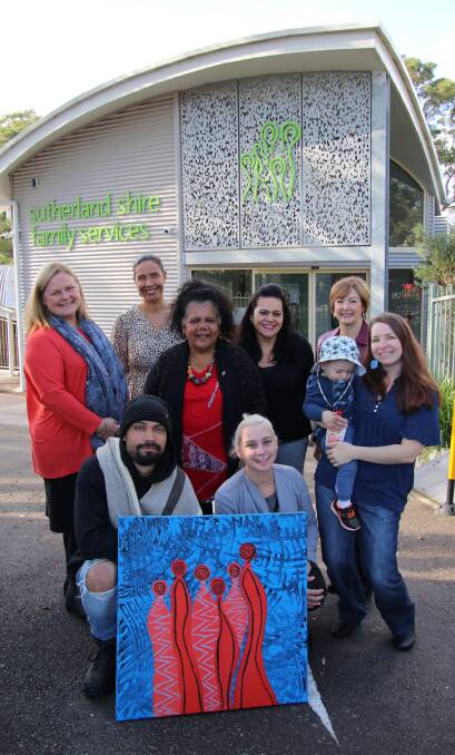Expanding cultural awareness: Aboriginal artist Dolly Brown features her artwork titled 'family' on the cover of the Reconciliation Action Plan for Sutherland Shire Family Services. It has become the inspiration for the logo.
