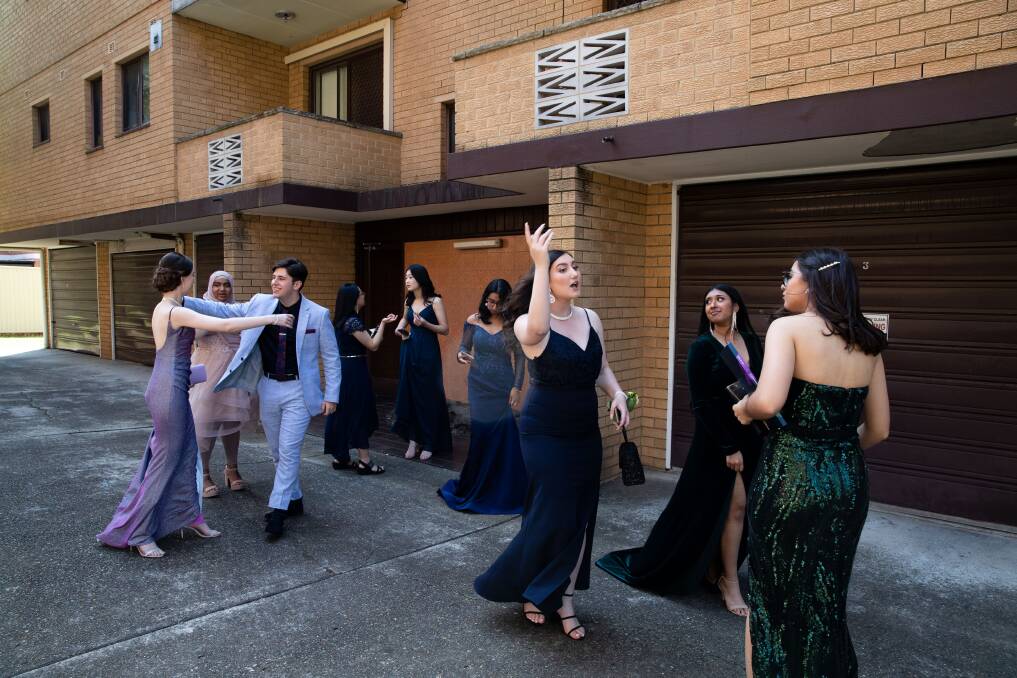 Vibrant: The photo that won the documentary category in this year's Australian Photography Awards was taken outside an apartment block at Penshurst where students from St George Girls' High School were off to their formal. Picture: Janie Barrett