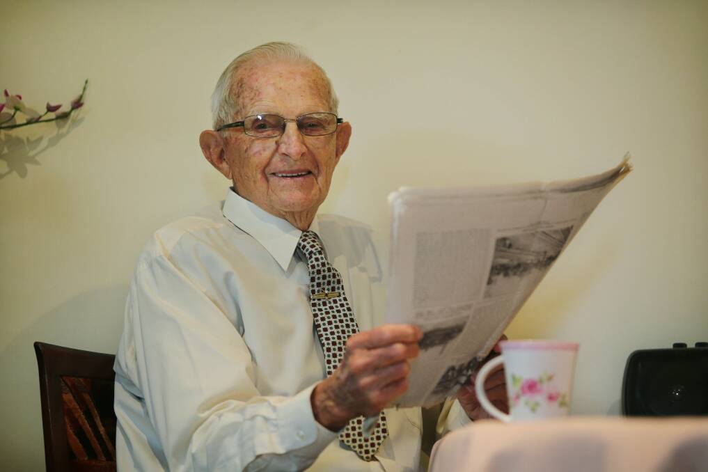 Many happy returns: David Napper, who turns 100 this year, enjoys a cup of tea and a newspaper from the 1940s. Picture: John Veage